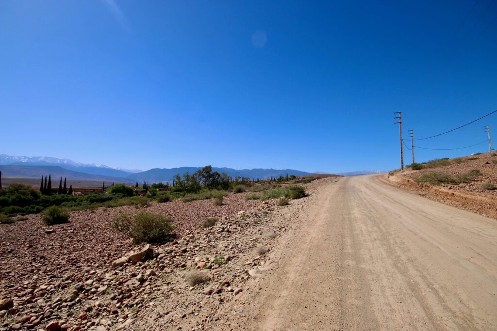 Cheap rental cars in Agadir - A dirt road leads through the Atlas Mountains near Agadir