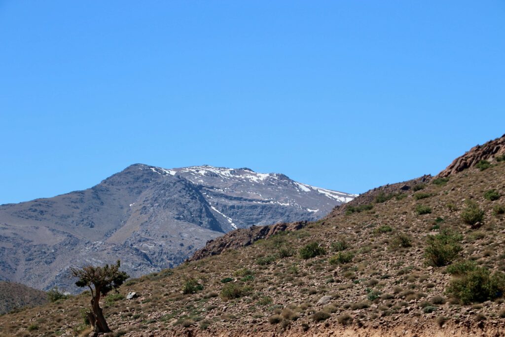 Snow blankets the summit of a mountain in the Atlas range