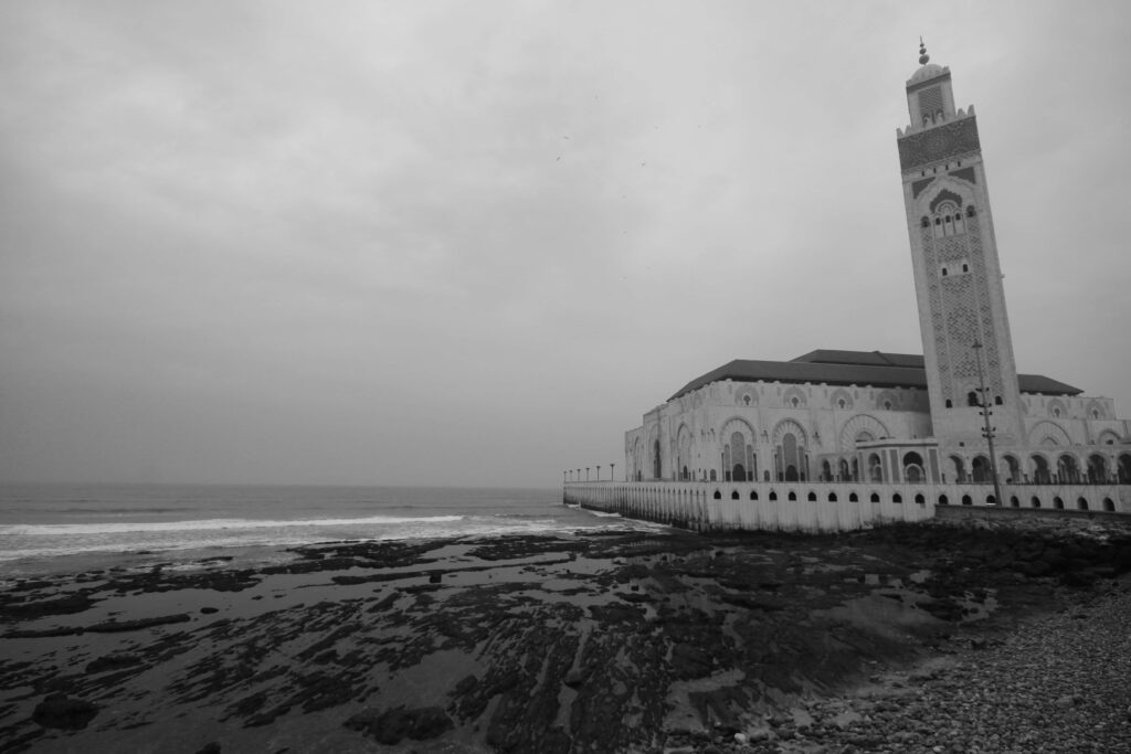 The monumental Hassan II Mosque rises above the coastline of Casablanca