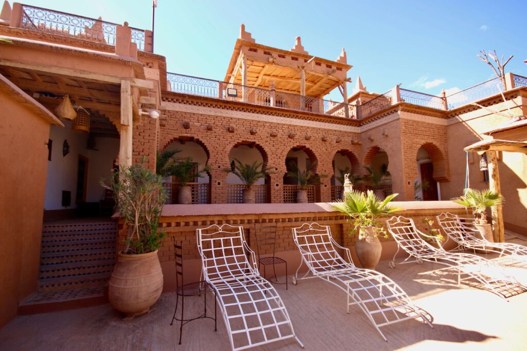 Sun loungers on a terrace at Dar Jnan Tiouira Dades, one of the best hotels in Dades Gorge