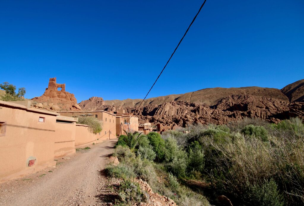 A road leads to a village in Dades Gorge, which is one of the best places to visit in Morocco in January
