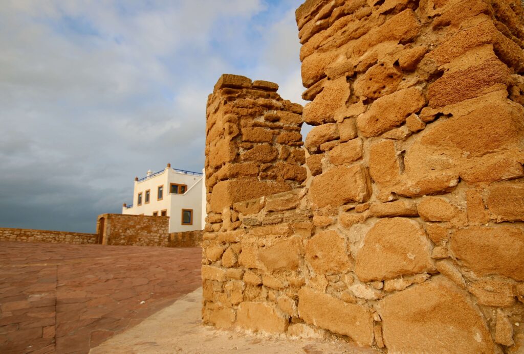 Is one day enough to see Essaouira? The late afternoon sun illuminates the stone ramparts of Essaouira