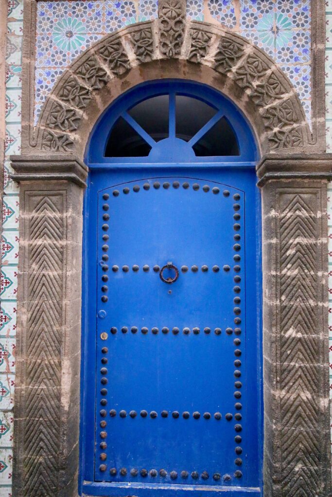 Is October a good time to visit Essaouira? An arched blue door in the Essaouira medina