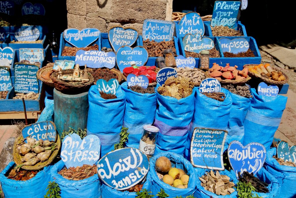 Visiting Essaouira in August - Spices for sale in blue sacks in the Essaouira medina