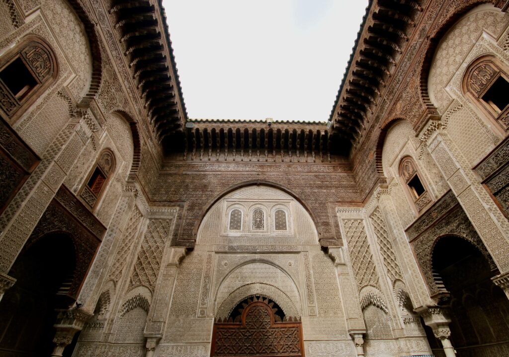 Intricate decorations adorn the courtyard of Al Attarine Madrasa in Fes