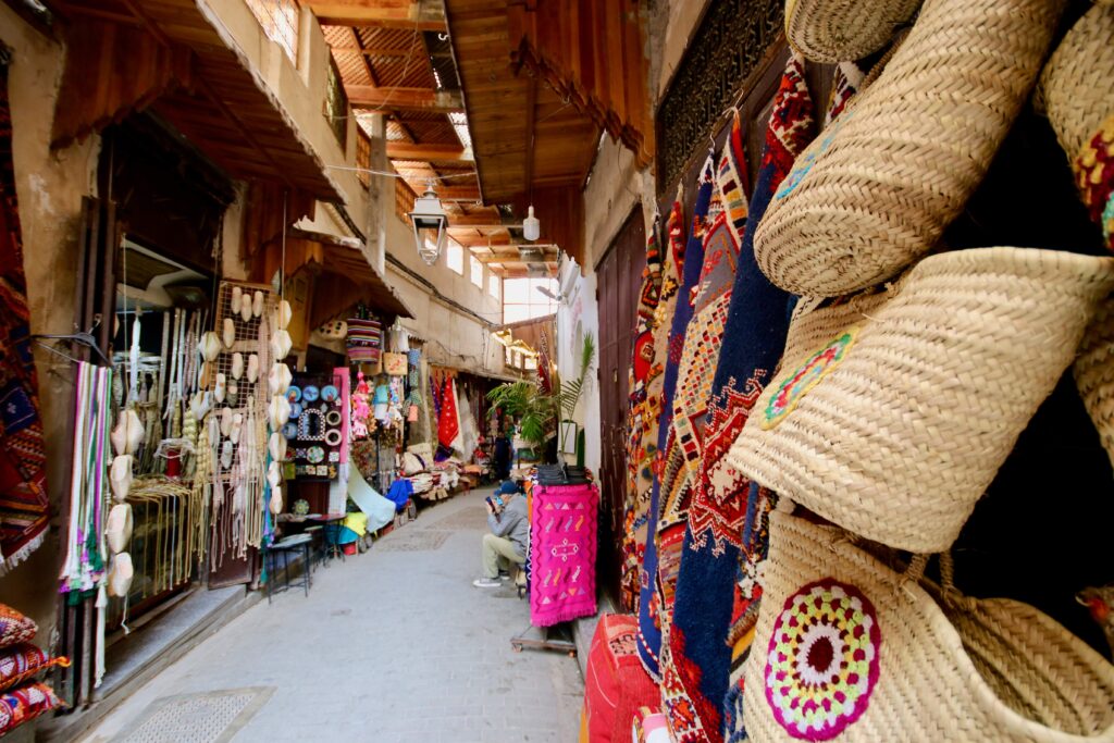 Is March a good time to visit Fes? Woven baskets and Amazigh rugs for sale in the Fes medina