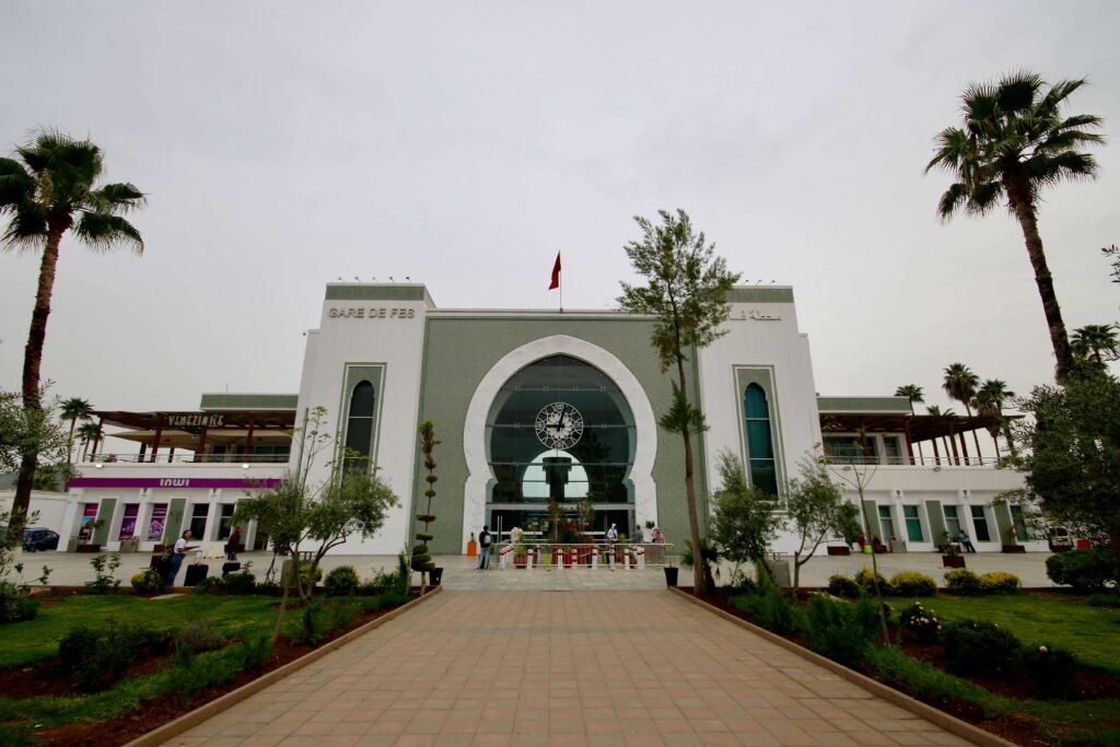 The arched entrance to the Fes railway station - travelling by train is one of the best ways to get from Casablanca to Fes