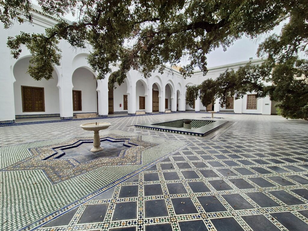 Best things to do in Fes - One of the fountain courtyards of Dar Batha in Fes, Morocco