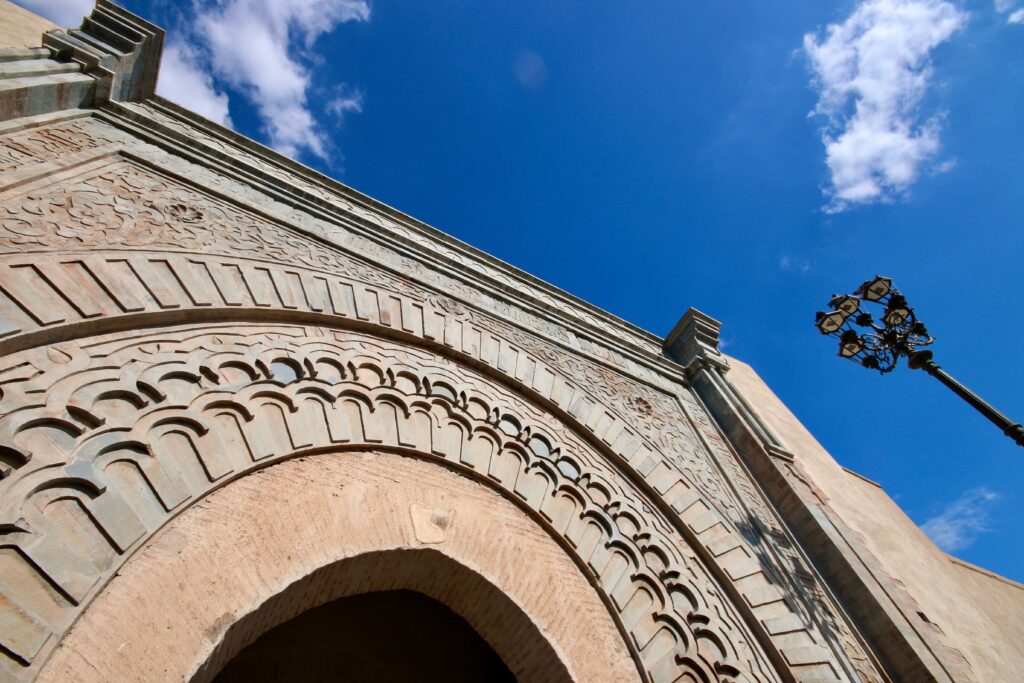 An ornately decorated gate leading to the Marrakech medina
