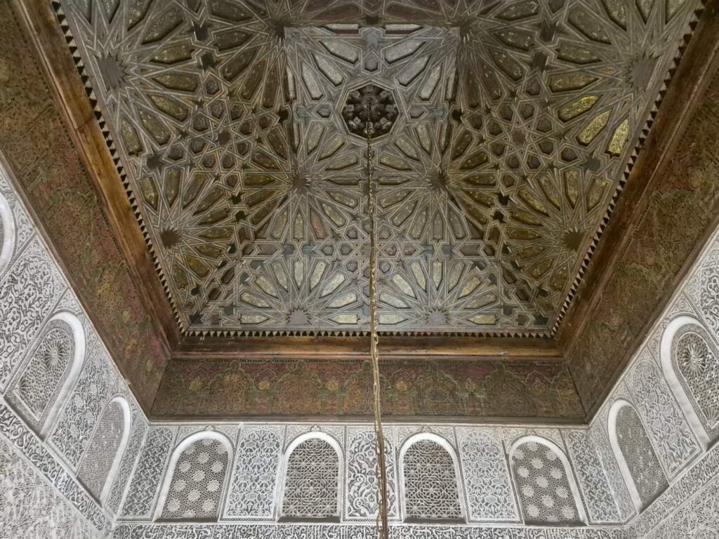 Is September a good time to visit Marrakech? Detail on a ceiling at the Ben Youssef Madrasa in Marrakech