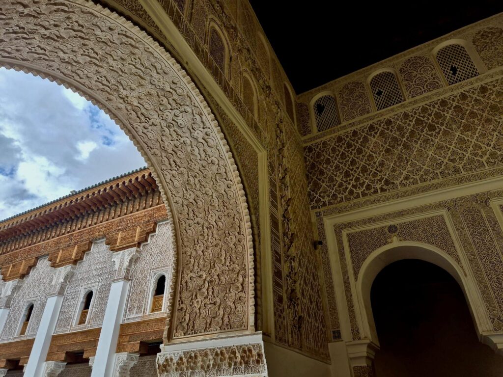 Elaborate decorations within the interior courtyard of Ben Youssef Madrasa in Marrakech