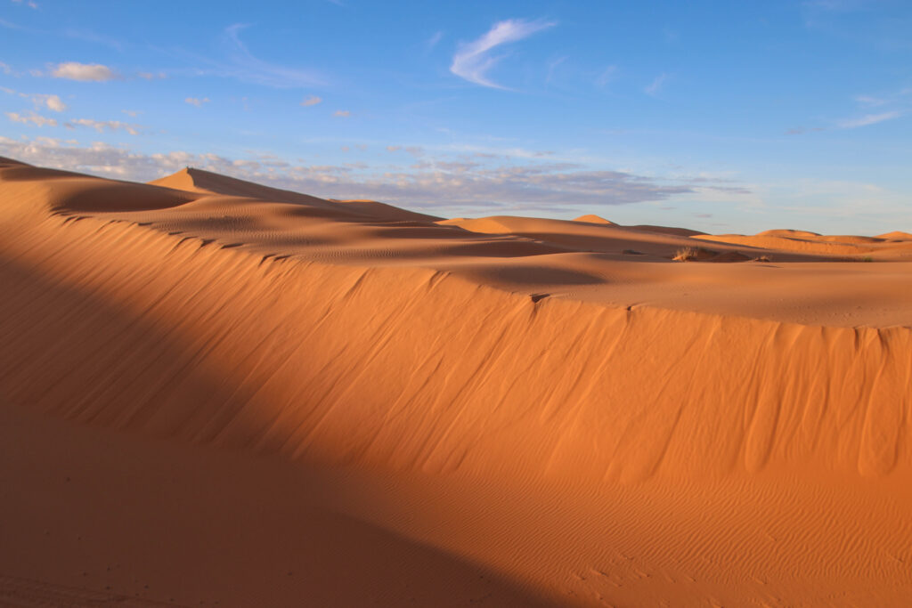 A wind-sculpted dune in the Sahara Desert, which can be reached on a guided tour from Marrakech