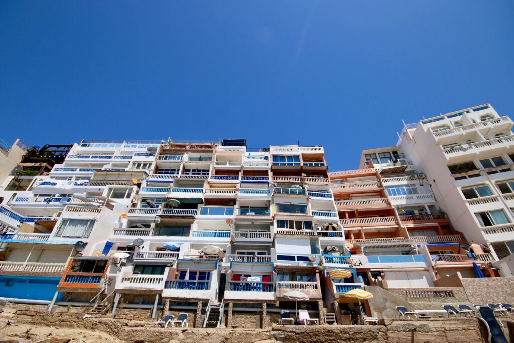 Colourful beach apartments overlooking a cove near Agadir
