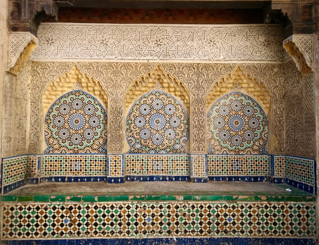 Mosaic tiles on a fountain in the Tangier medina