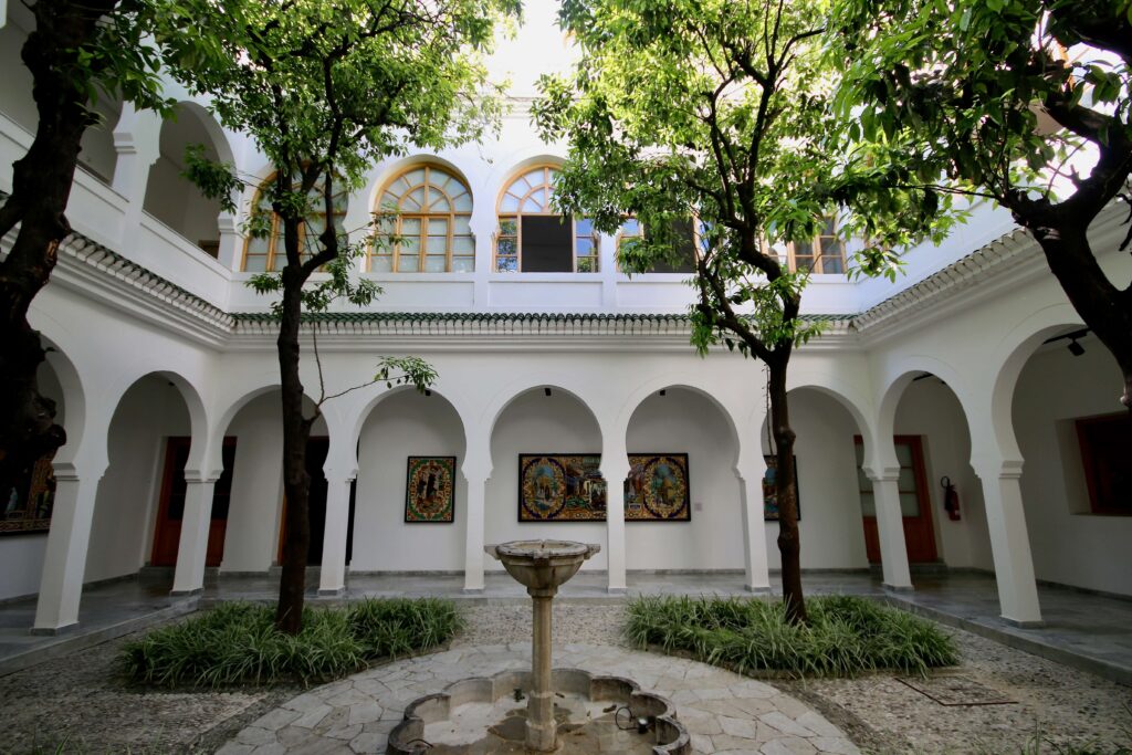 The leafy interior courtyard of Dar Niaba Museum in Tangier