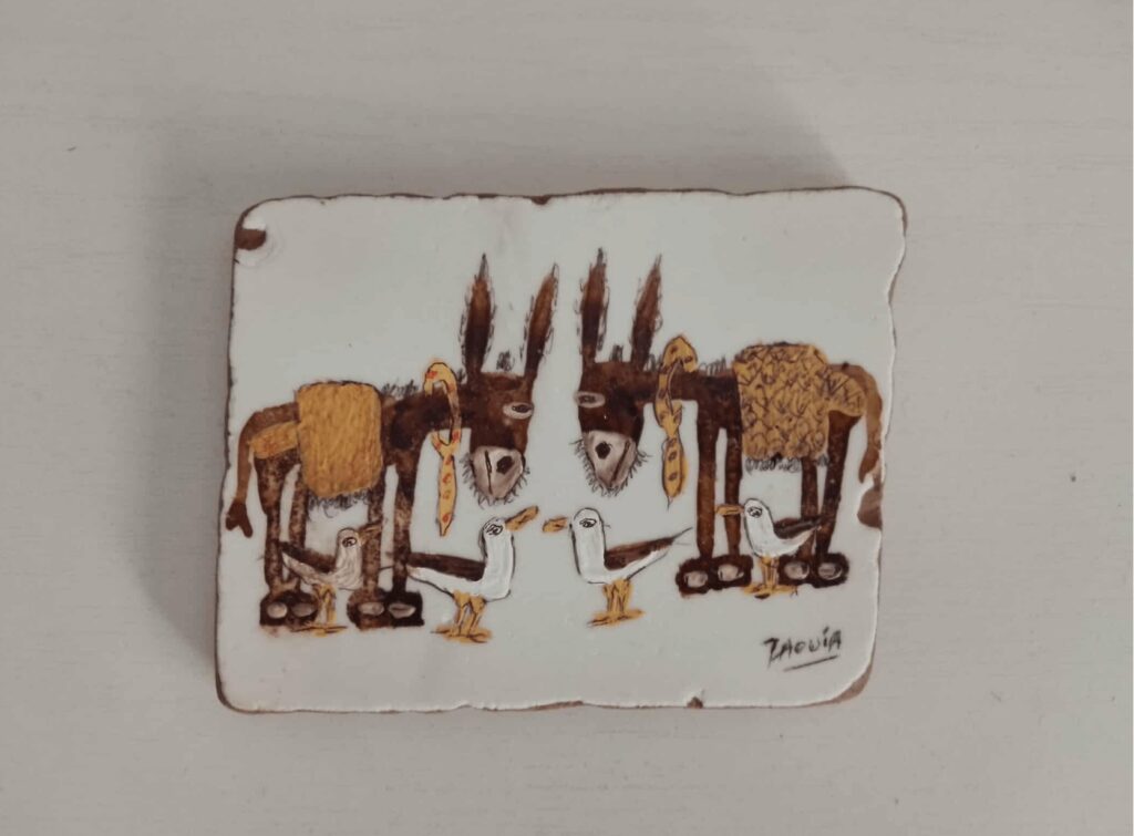 A painting of donkeys and seagulls I bought from a small art gallery in Essaouira