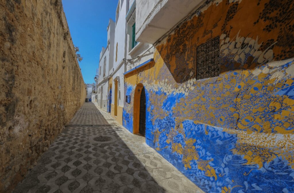 A colourful mural decorates a building in the Asilah medina