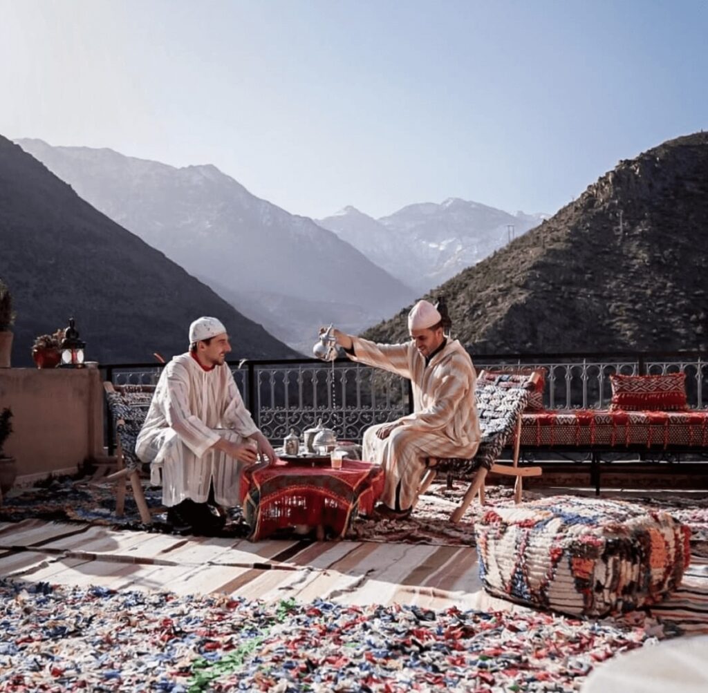 Tea being poured on a terrace at one of the best hotels in Imlil