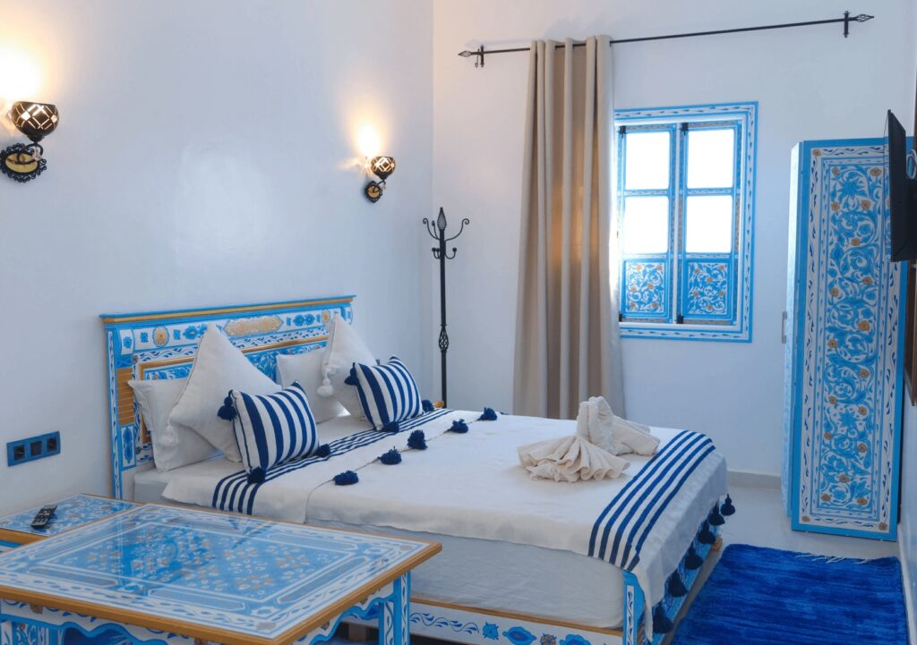 A blue and white themed room at Casa Blue Pearl, one of the best hotels in Chefchaouen