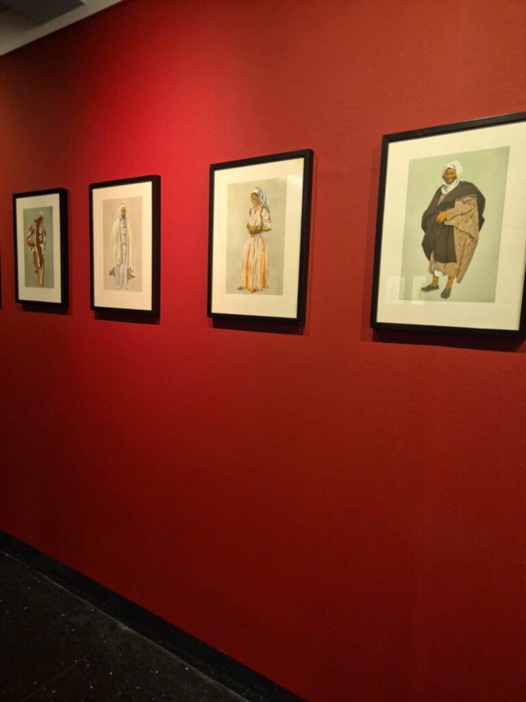 Paintings of Moroccans in a gallery space at the Abderrahman Slaoui Museum in Casablanca