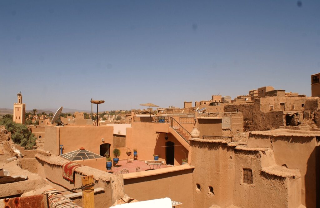 Views across the earthen buildings surrounding Dar El Nath, one of the best hotels in Ouarzazate