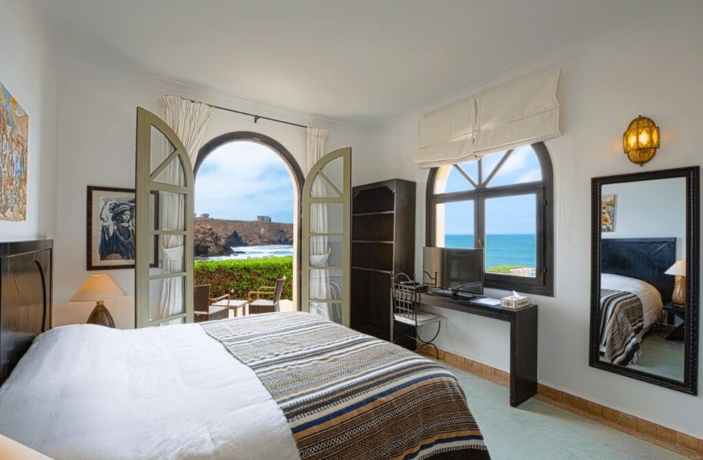 Best places to stay in Mirleft and Sidi Ifni: Spectacular views across the coastline from one of the breezy rooms at Auberge Dar Najmat in Mirleft
