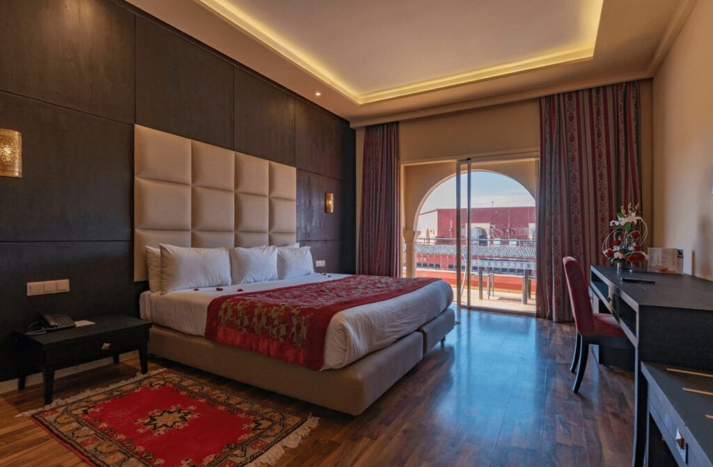 A spacious room with balcony at Eden Andalou Aquapark & Spa, one of the best all-inclusive resorts in Marrakech (photo courtesy of Expedia)