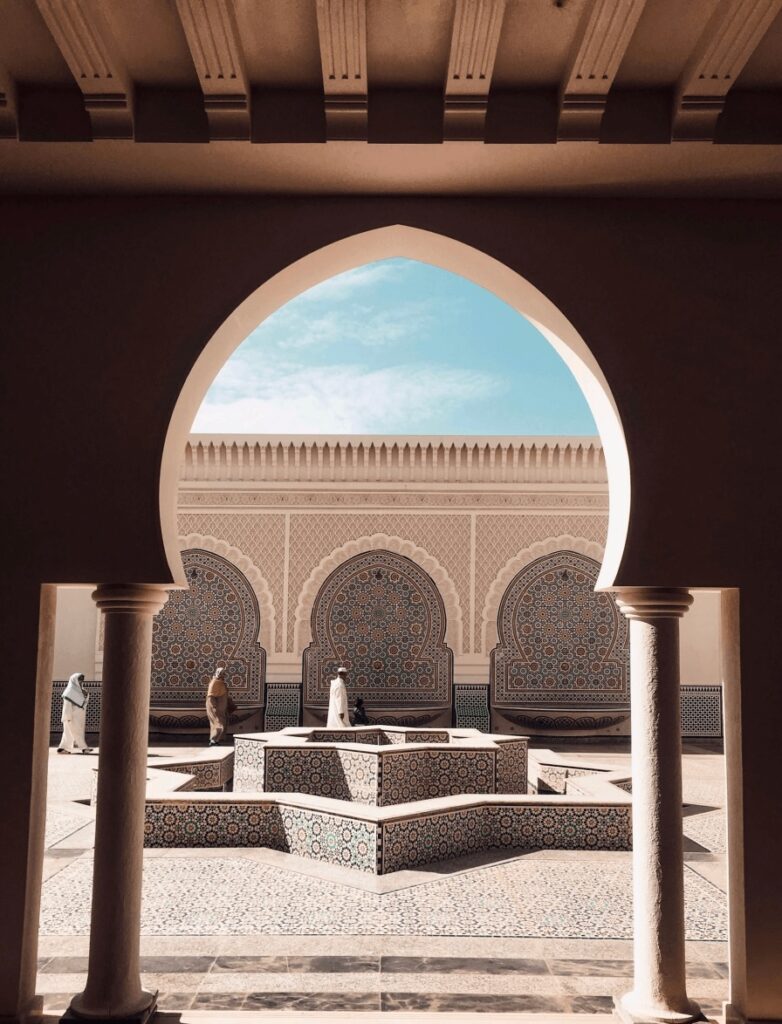 An arch leads to the courtyard of a mosque in Errachidia