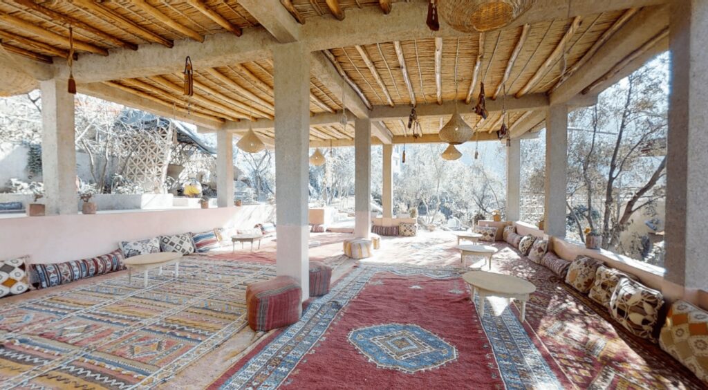 An outdoor Moroccan lounge at Ferme by Ikalimo, which is one of the best places to stay in Ourika for families