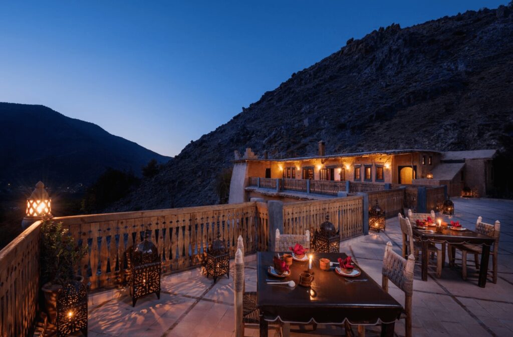 Lanterns illuminate the terrace of Hotel Le Village du Toubkal, a budget hotel in the High Atlas Mountains