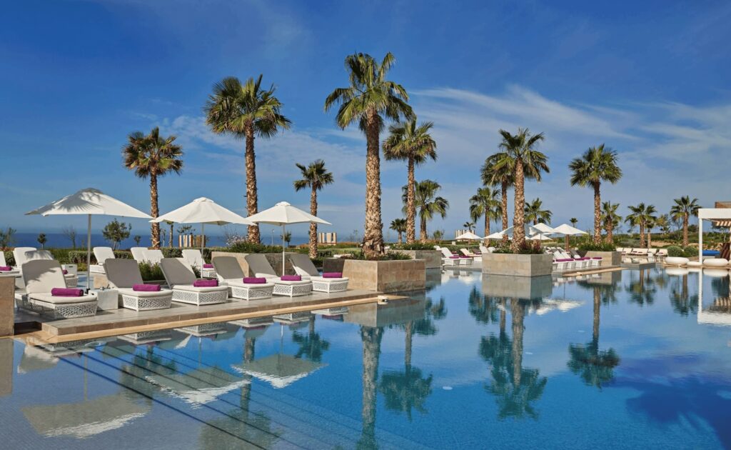 Planning a golf holiday in Agadir - Sun loungers beside a swimming pool at one of the best golf hotels in Agadir
