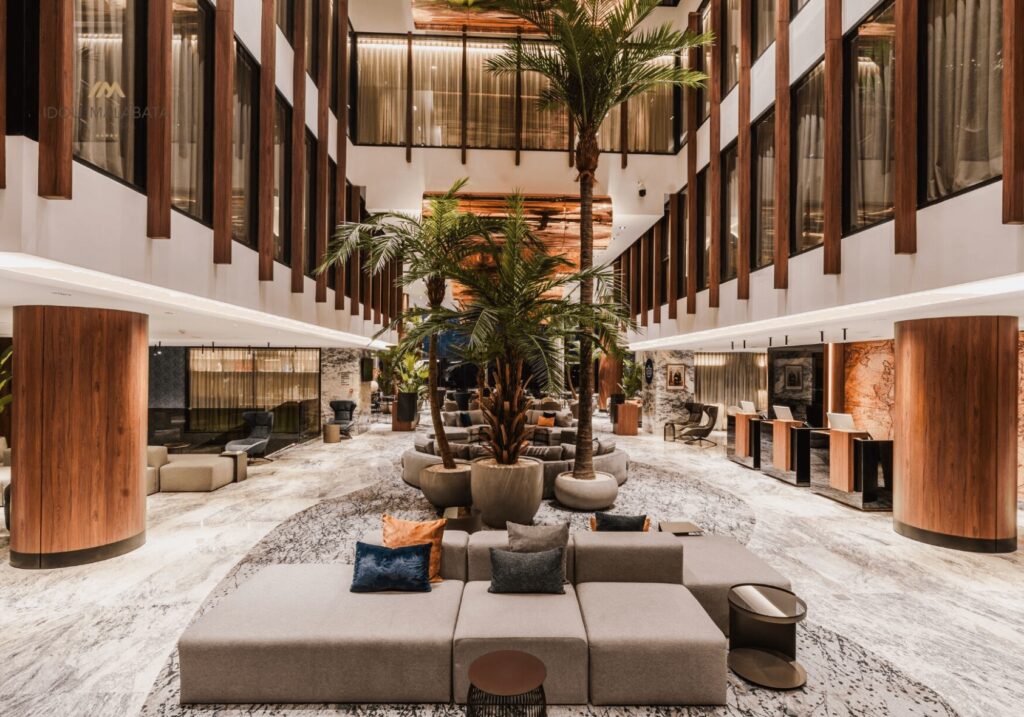 Best hotels in Tangier - Palm trees inside the lobby of Idou Malabata Beach & Spa 