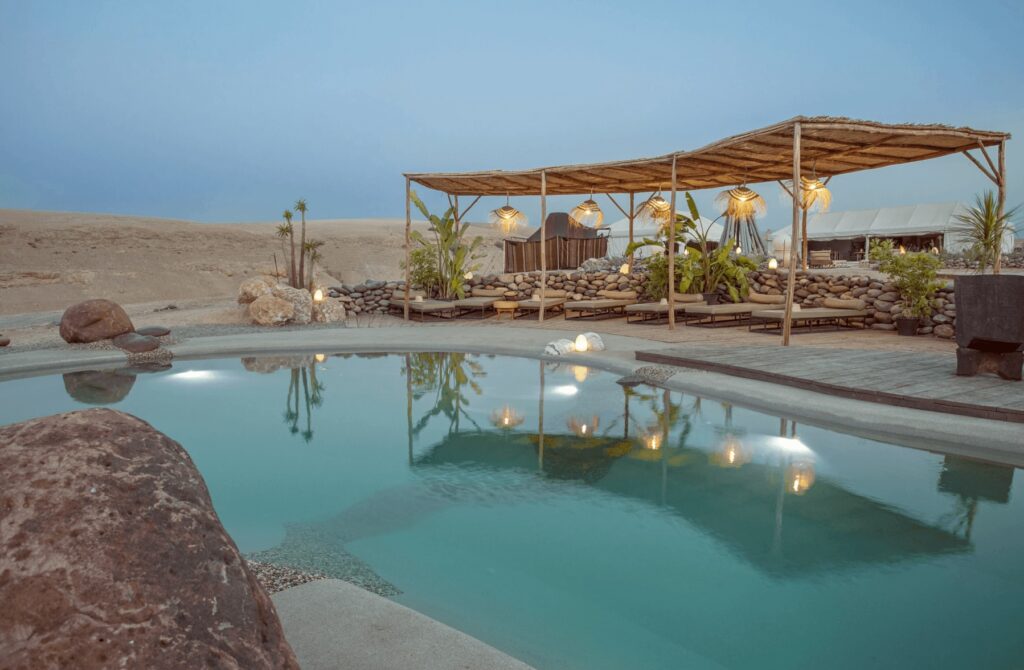 Best luxury hotels with pools in Marrakech - Spectacular desert views from a pool at Inara Camp in Agafay