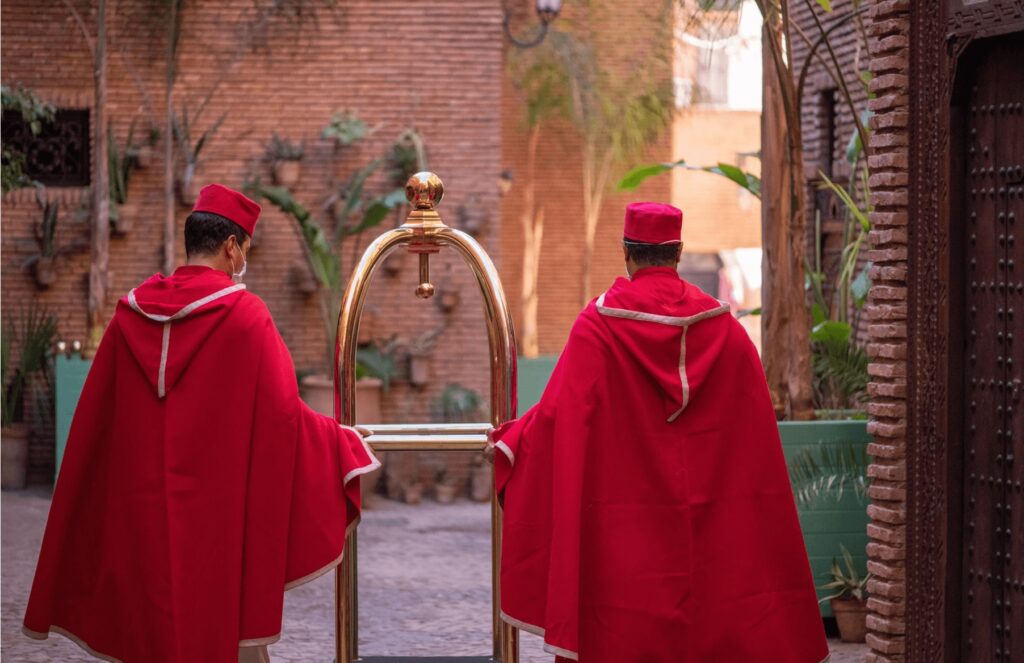 Traditionally dressed porters at one of the best luxury boutique hotels in Marrakech
