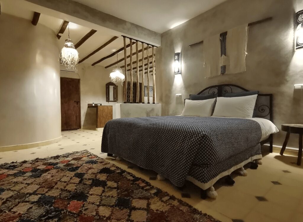 Traditional textiles decorate a room at Les Jardins de Taja, an eco-friendly hotel in Ourika Valley