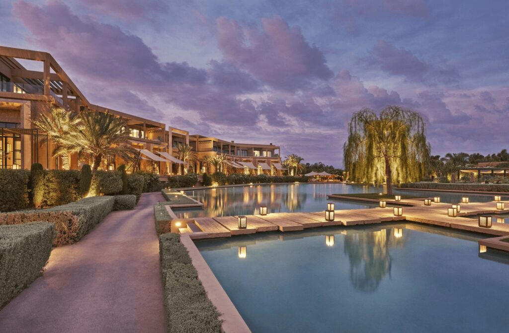 Lanterns fringe the expansive swimming pool at the Mandarin Oriental in Marrakech