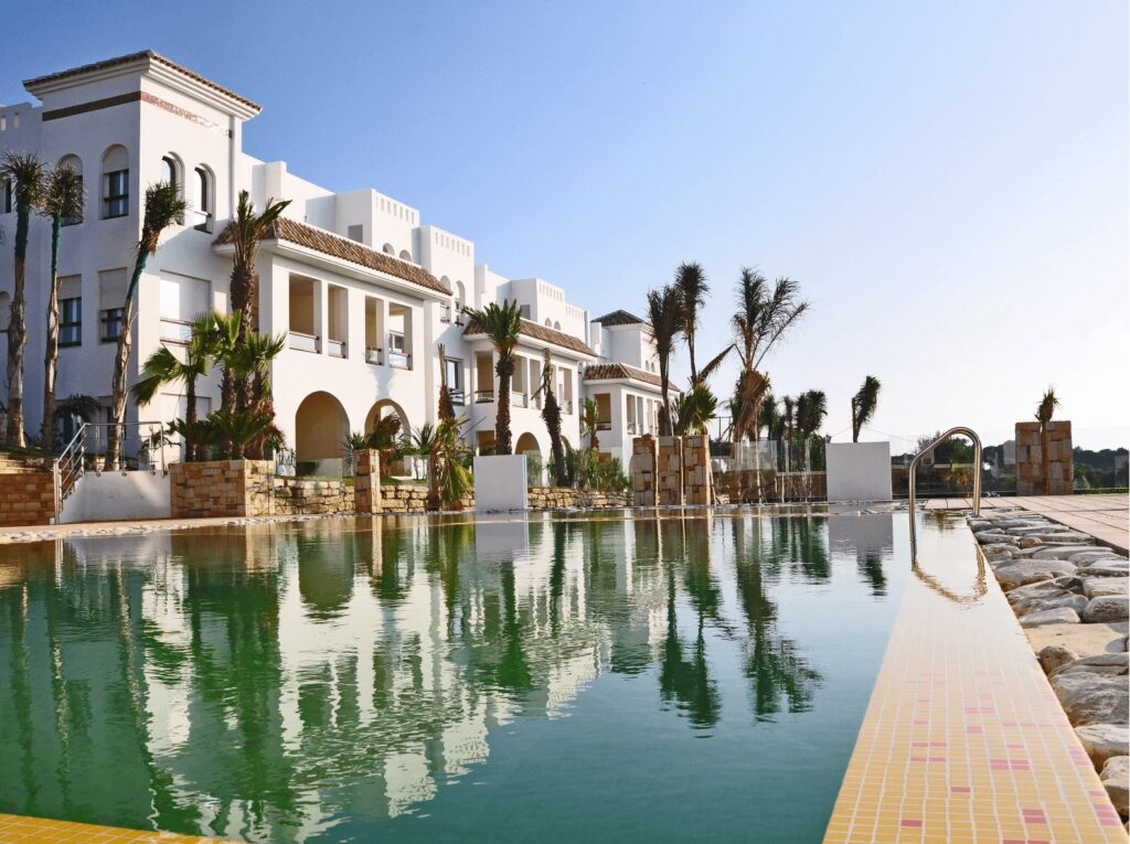 Reflections in the swimming pool at Mnar Castle near Tangier 