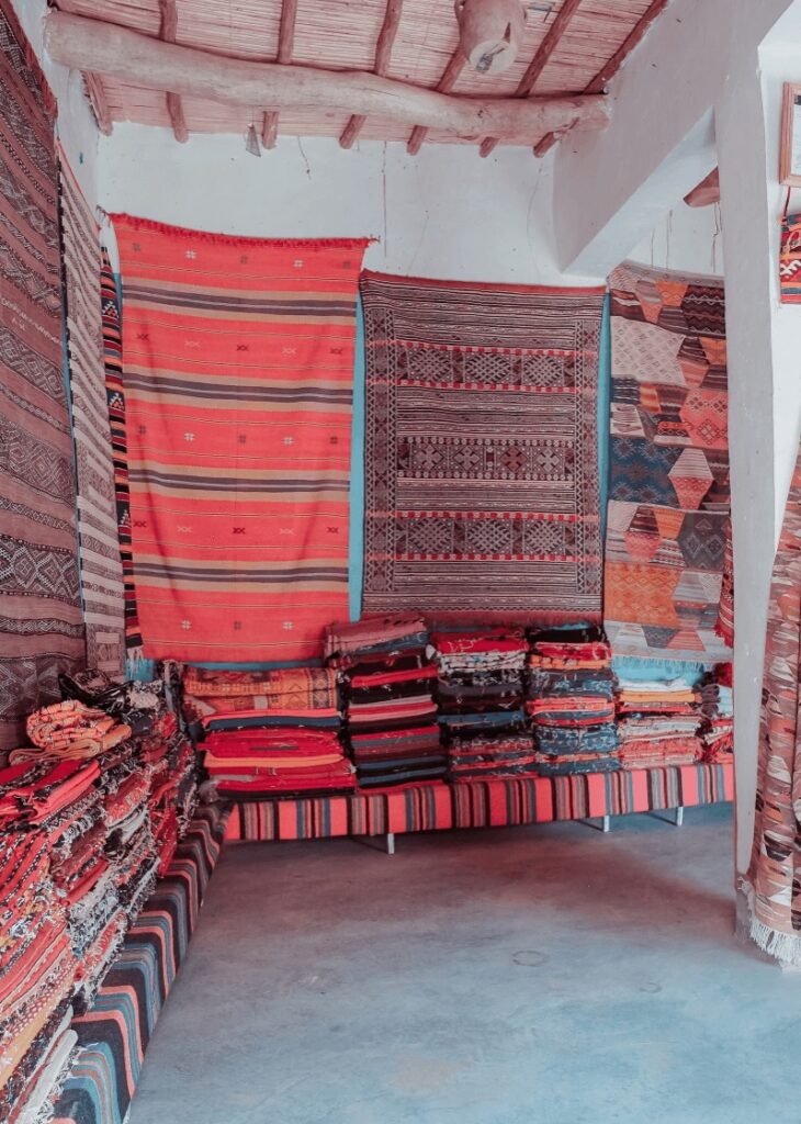 Colourful rugs for sale in a Moroccan town