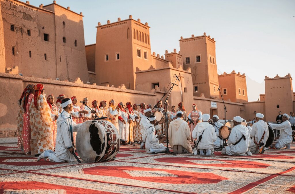 Amazigh musicians perform outside a kasbah in Morocco