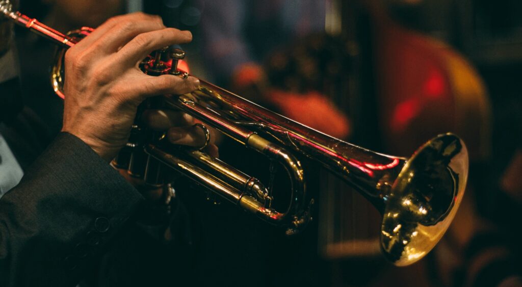 Best music festivals in Morocco - A close-up shot of a trumpet player during a jazz music festival in Morocco
