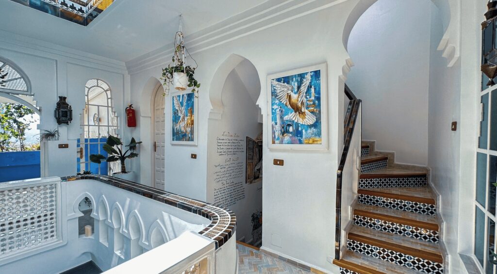 A whitewashed courtyard at a highly-rated hotel in Chefchaouen