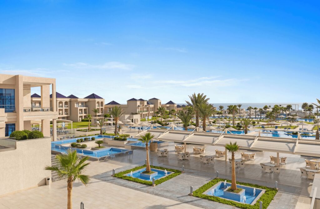 The palm-studded grounds of Pickalbatros White Beach Taghazout