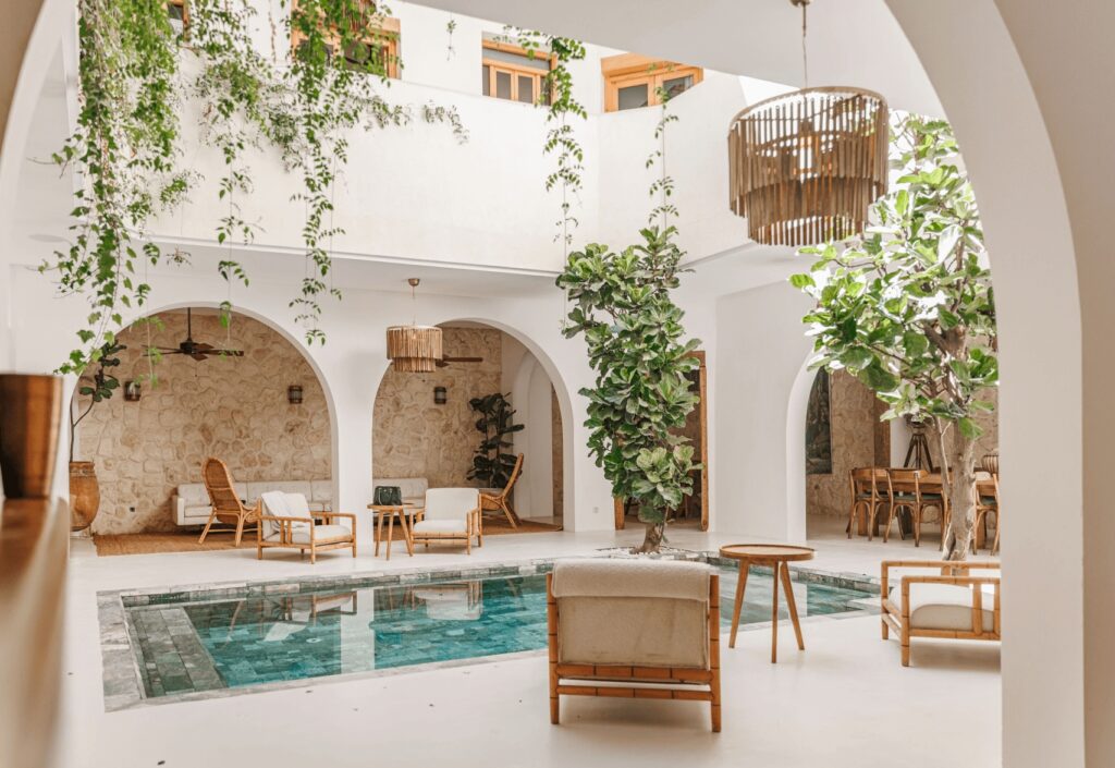 The serene pool courtyard of Pure House Marrakech, one of the best luxury riads in Marrakech with a pool