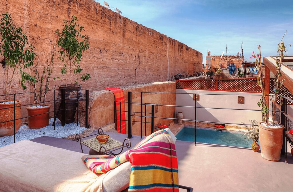 The rooftop terrace and pool at Riad Carina - a budget-friendly hotel in Marrakech 