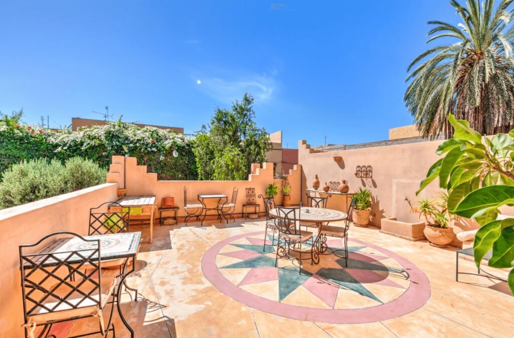 A sun-drenched terrace at Riad Janoub, a highly-rated hotel in Tiznit, Morocco
