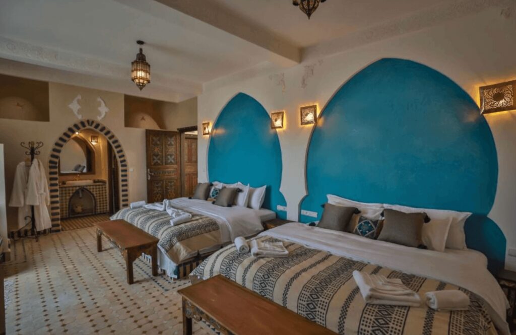 One of the beautifully decorated suites at Riad Jouba, one of the best kasbah hotels and riads in Merzouga