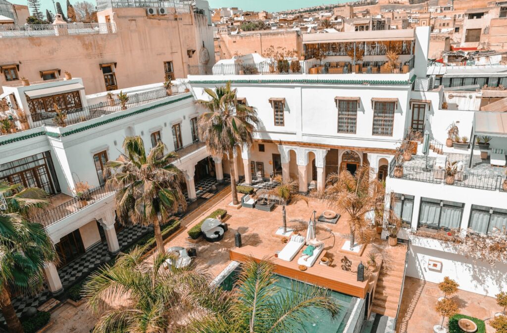 An elevated view across the internal courtyard of Riad Mayfez Suites & Spa, one of the best 5-star hotels in Fes
