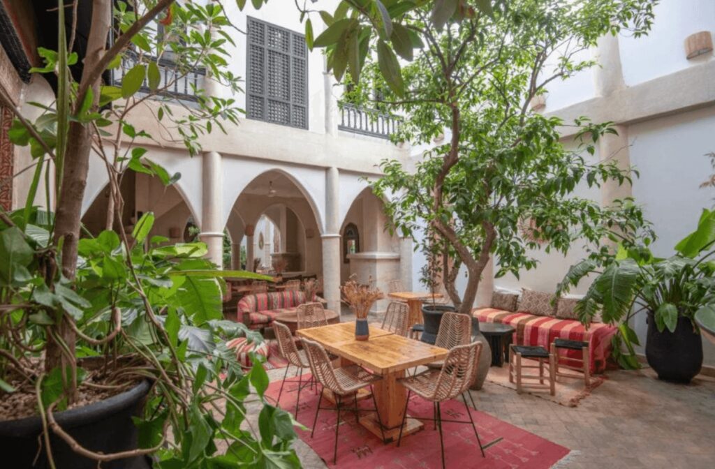 The leafy interior courtyard of Riad Spa Sindibad in the Marrakech medina