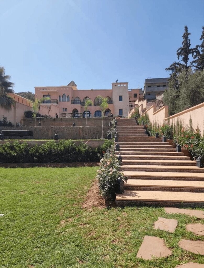 Steps lead up to Riad Timskrine, a luxury riad in Ourika Valley, Morocco