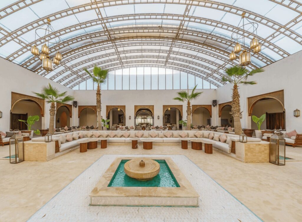A glass-roofed atrium at the Sofitel Agadir Royal Bay Resort, one of the best hotels in Agadir with a pool
